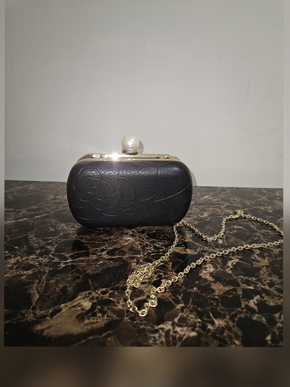 Charming Charlie Black Floral-Embossed Pearl-Clasp Clutch with Gold Chain